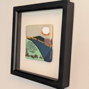 Windswept framed tile